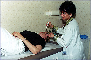 Dr. Michelson performing an intranasal examination for a patient contemplating rhinoplasty. 